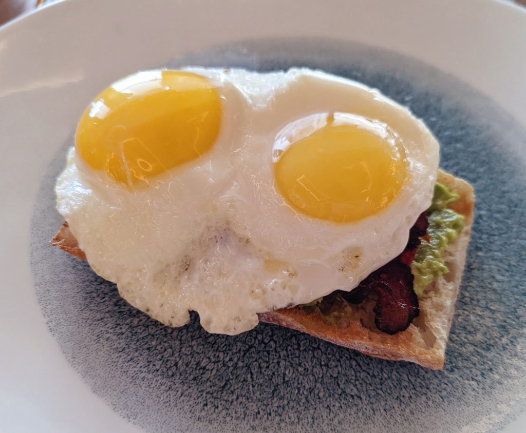 avocado toast with sunny side up egg