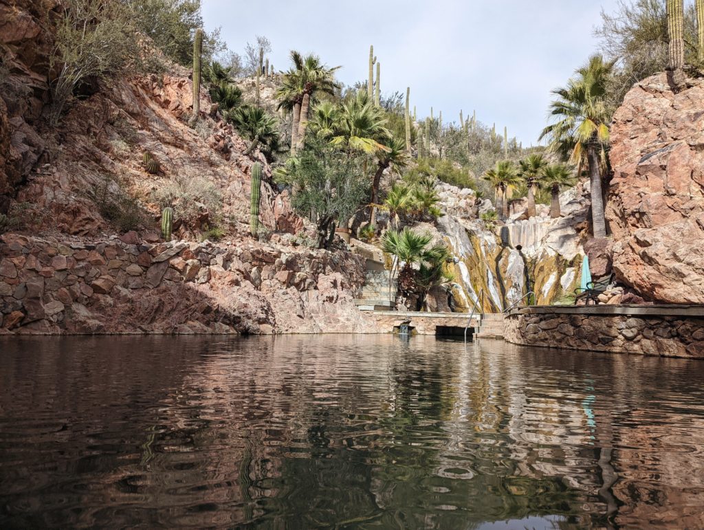 view of the second hot spring at Castle Hot Springs. This second hot spring is surrounded by rocks and blocked by a walkway from the hottest hot spring