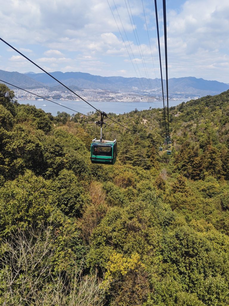 View of the forests and ocean from the Miyajima Mount Misen ropeway