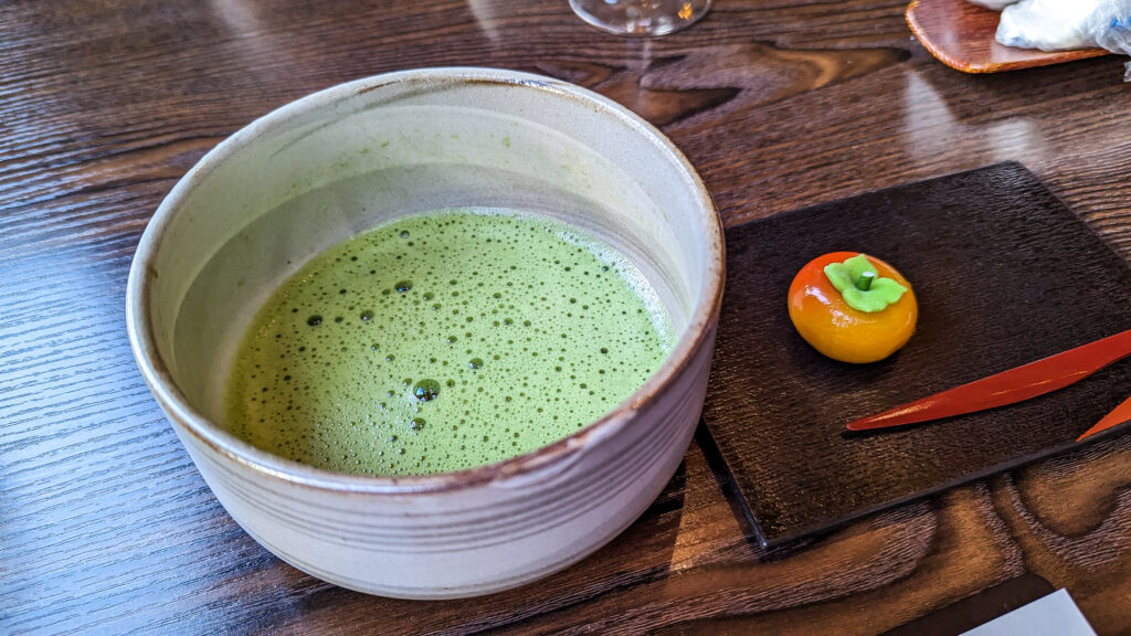 bright green Matcha Tea and fall seasonal wagashi (Japanese confectionary)