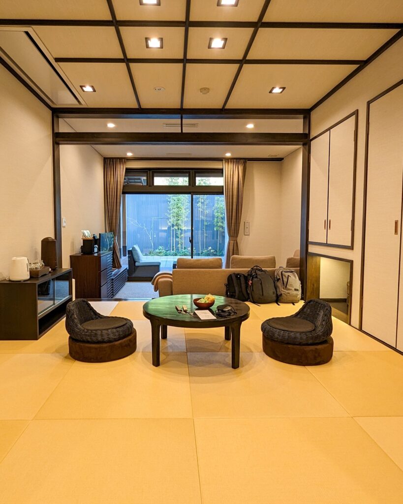 view from the aqua annex deluxe suite into the tatami sitting area and modern living space