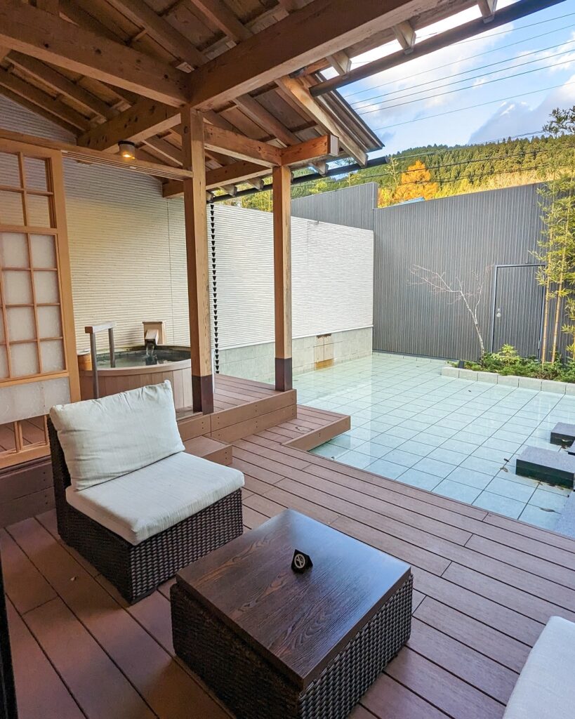 outdoor patio with open-air bath in the okunoin hotel tokugawa aqua annex