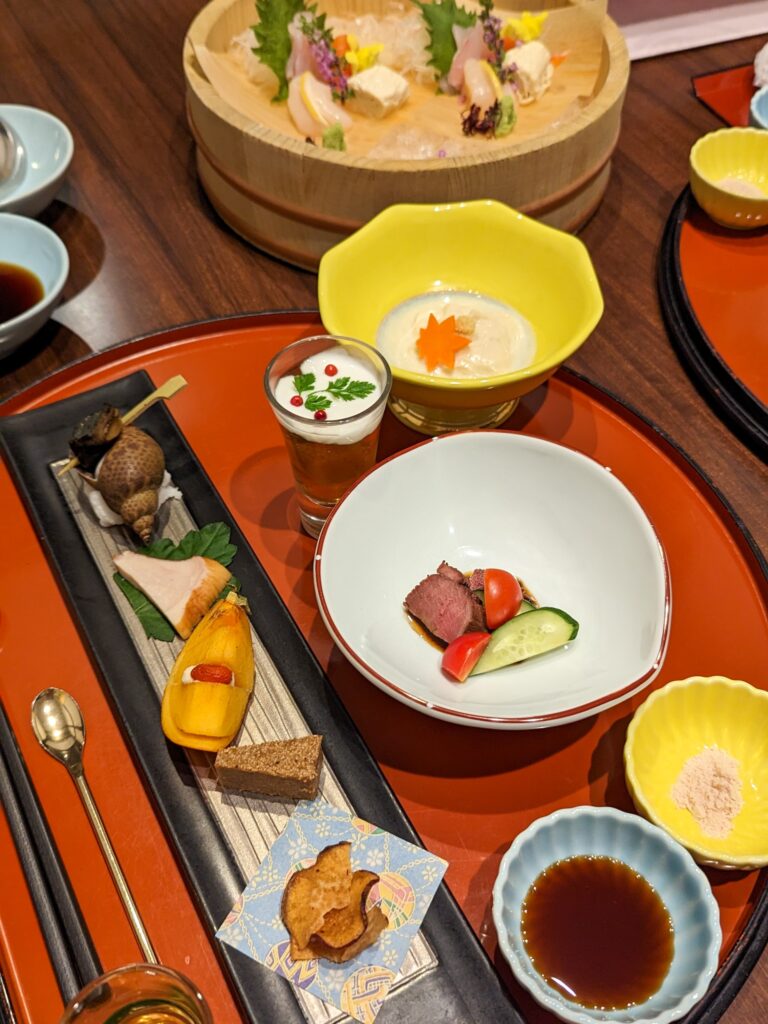 Pickled veggies and small bites as the first kaiseki course