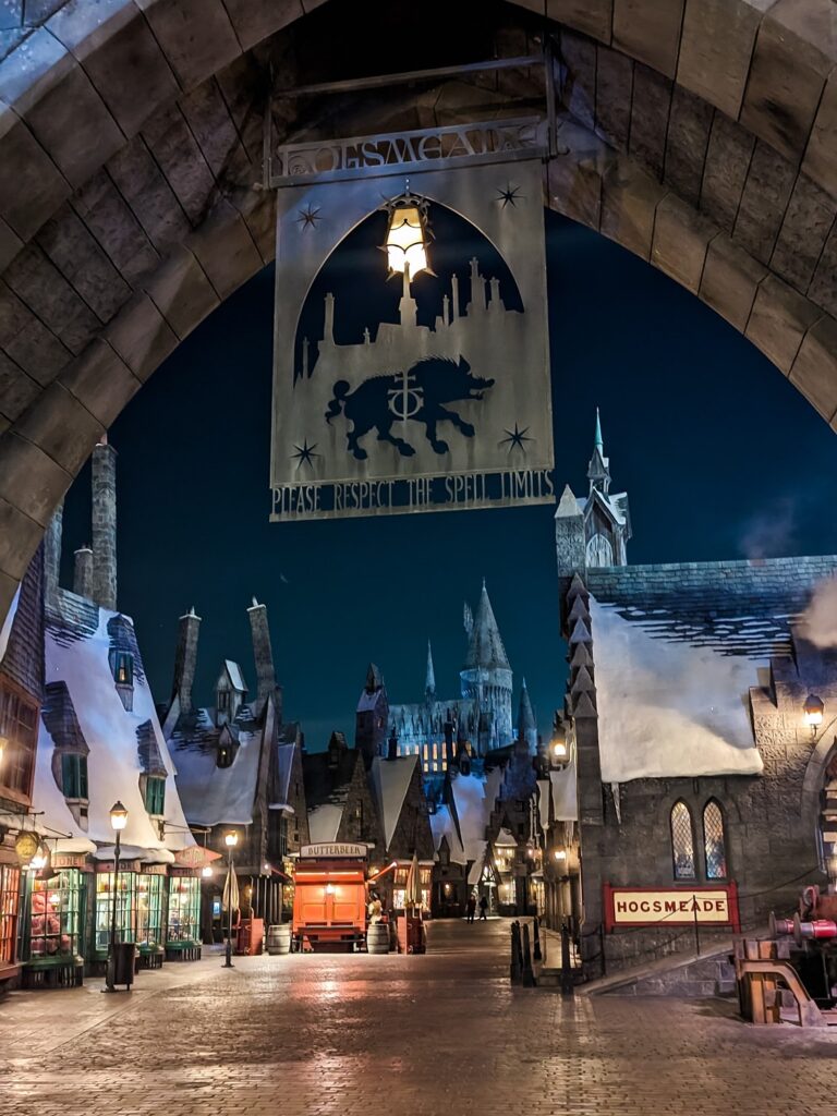 Entrance to Hogsmeade at Universal Studios at night with no other guests.