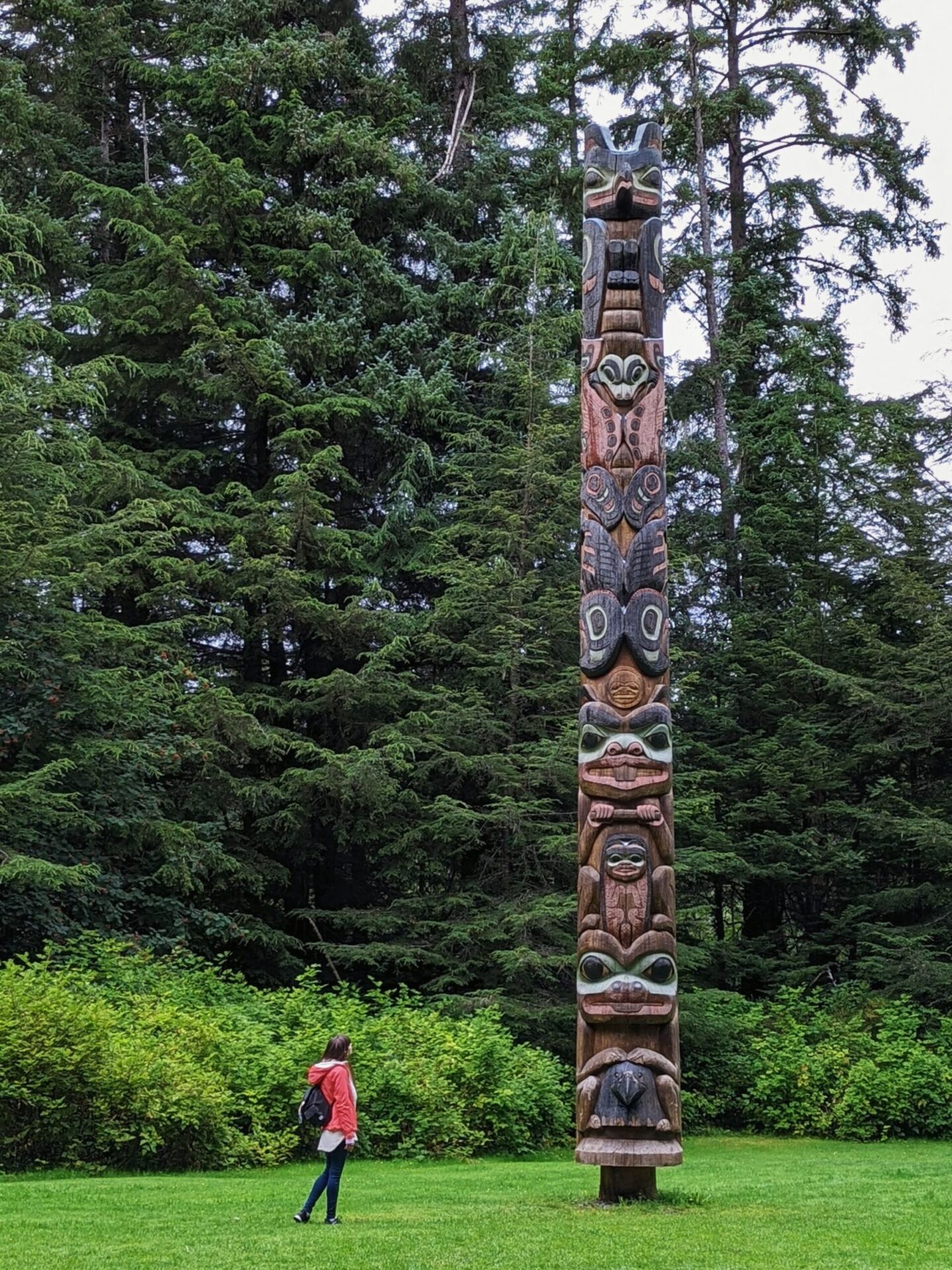 Gabi, The Fringe Explorer, Looking at a replica totem pole at the site of The Battle of Sitka