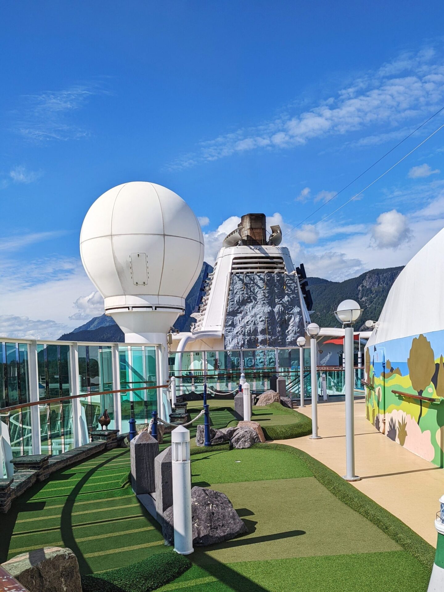 View of the mini golf course and rock wall on Serenade of the Seas