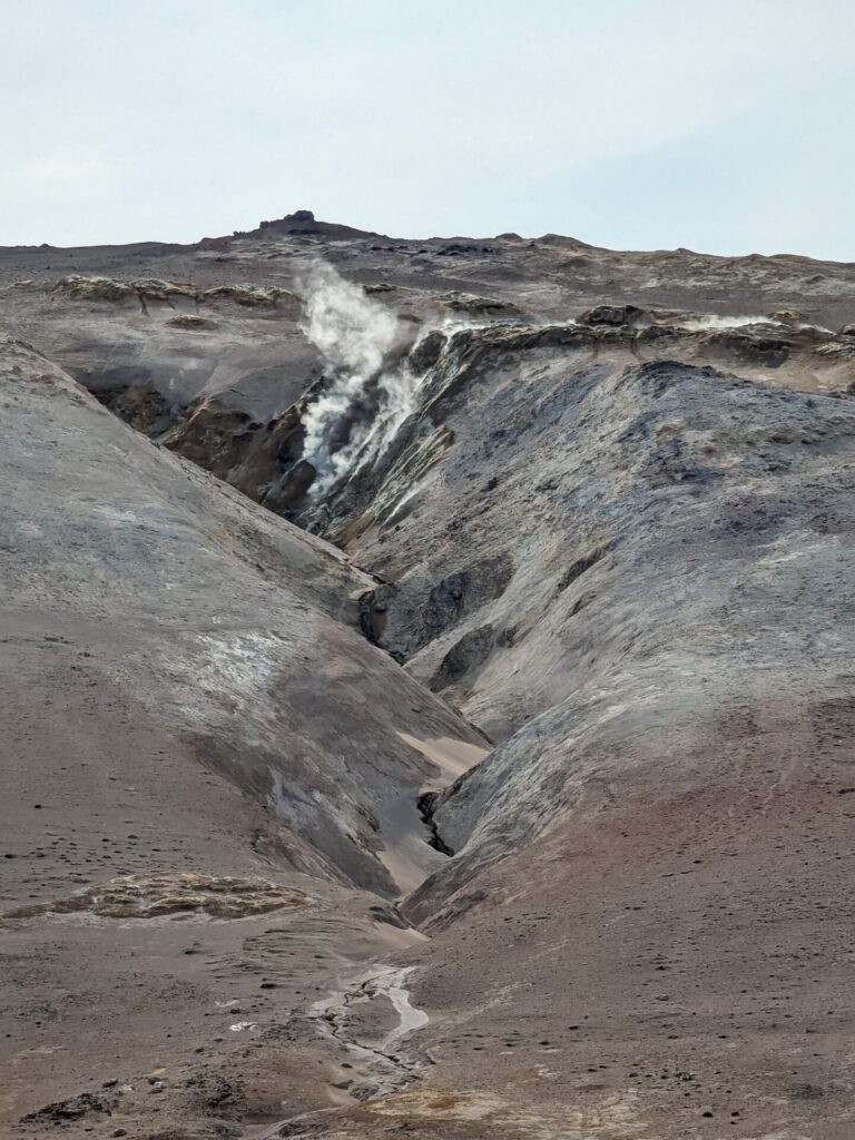 Cliffside crevice with fumaroles