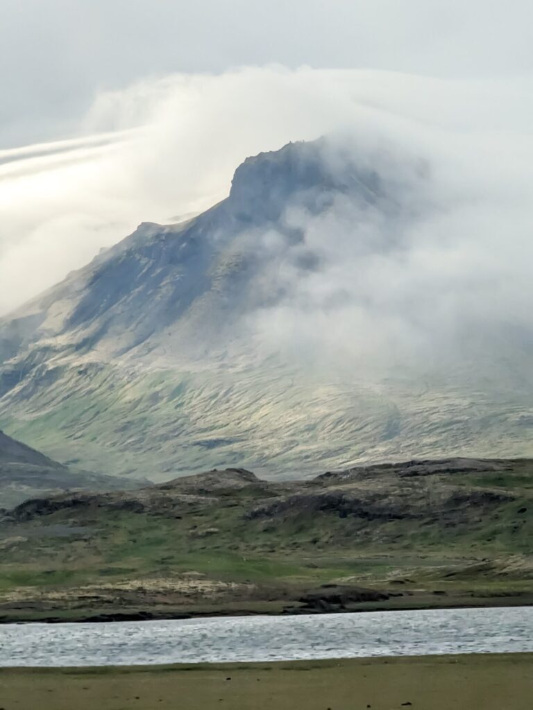 Mossy mountain covered in fog