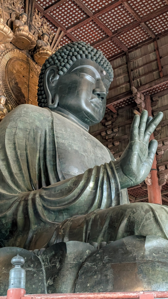 Massive bronze Great Buddha statue inside the main hall of Todai-ji Temple in Nara.