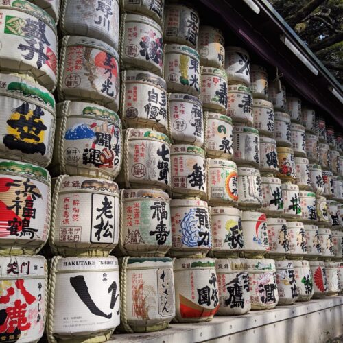 Sake barrels stacked as a wall outside of Meiji Shrine