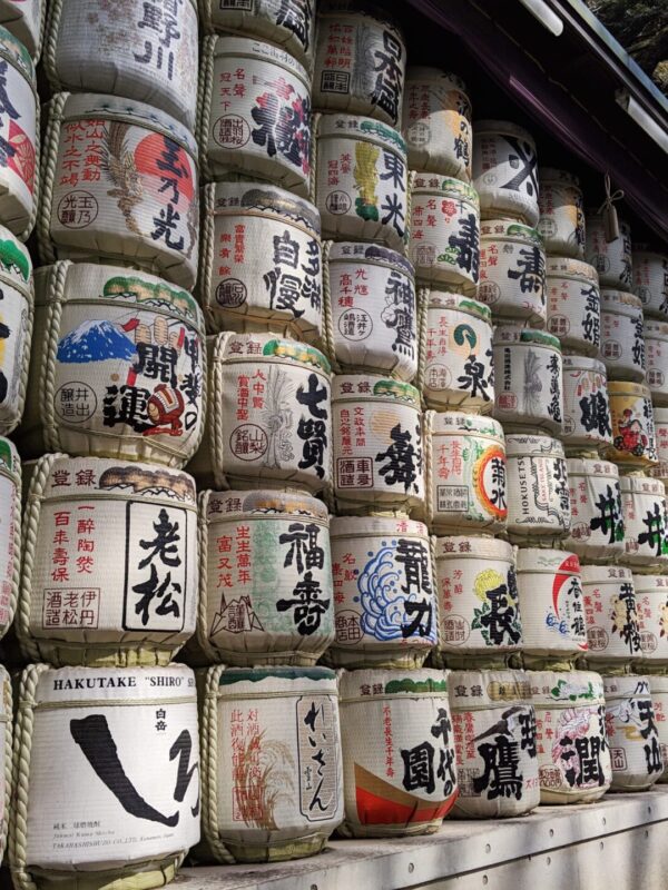 Sake barrels stacked as a wall outside of Meiji Shrine